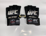 James “Sandman” Irvin UFC 65 Autographed Fight Worn Gloves & Mouthguard